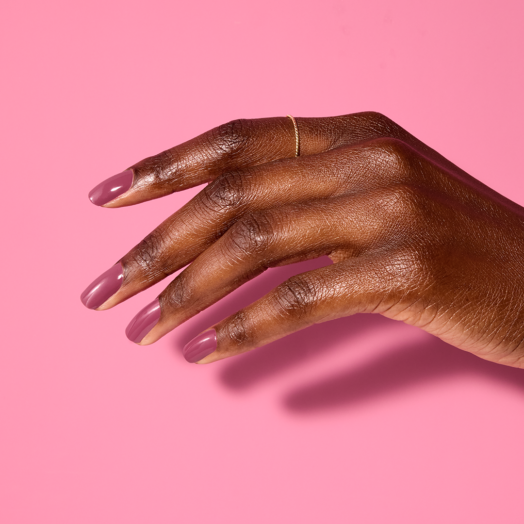 Hand with Take A Chance painted on nails