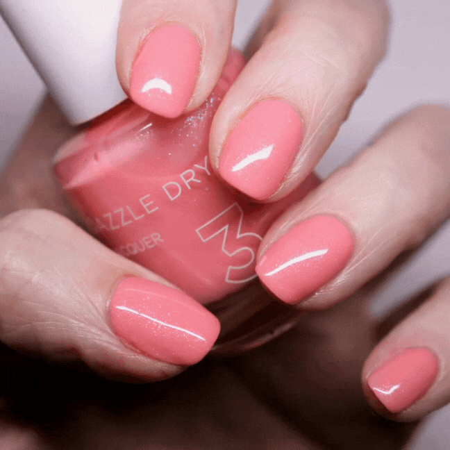 Hand Holding Cherry Blossom Painted on the nails