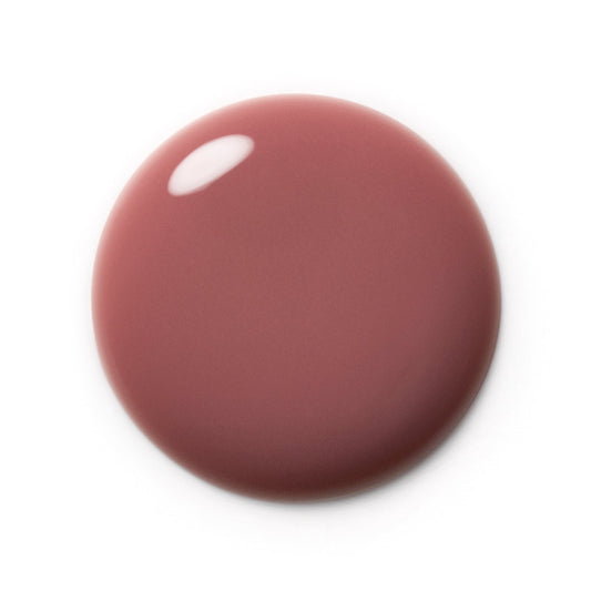 A smooth, rounded swatch of dusty rose pink cosmetic cream or gel, shown on a clean white background with a soft drop shadow.