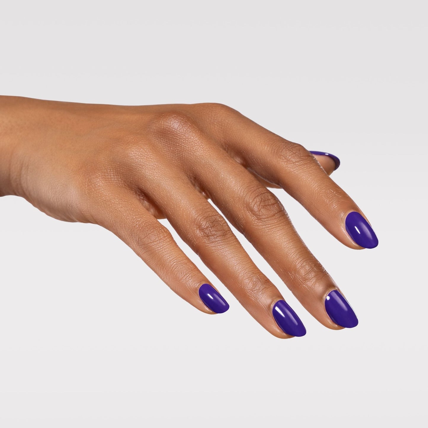 Hand with Epiphany painted on nails