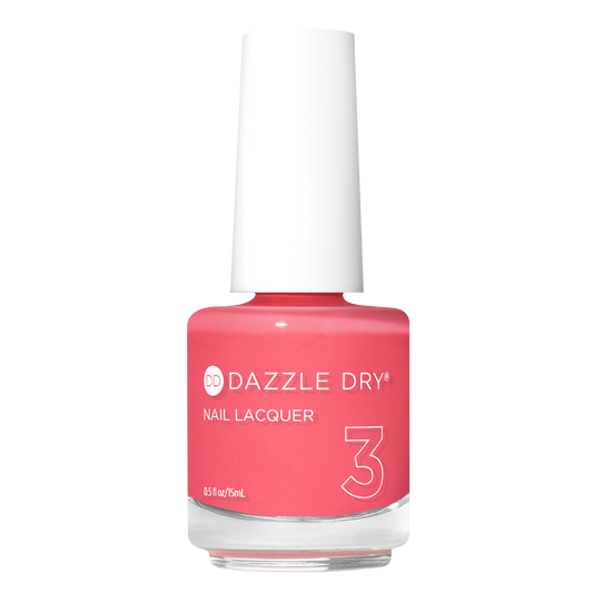 A bottle of Dazzle Dry Nail Lacquer in shade 3, featuring a vibrant coral pink color with a white cap, set against a plain white background.