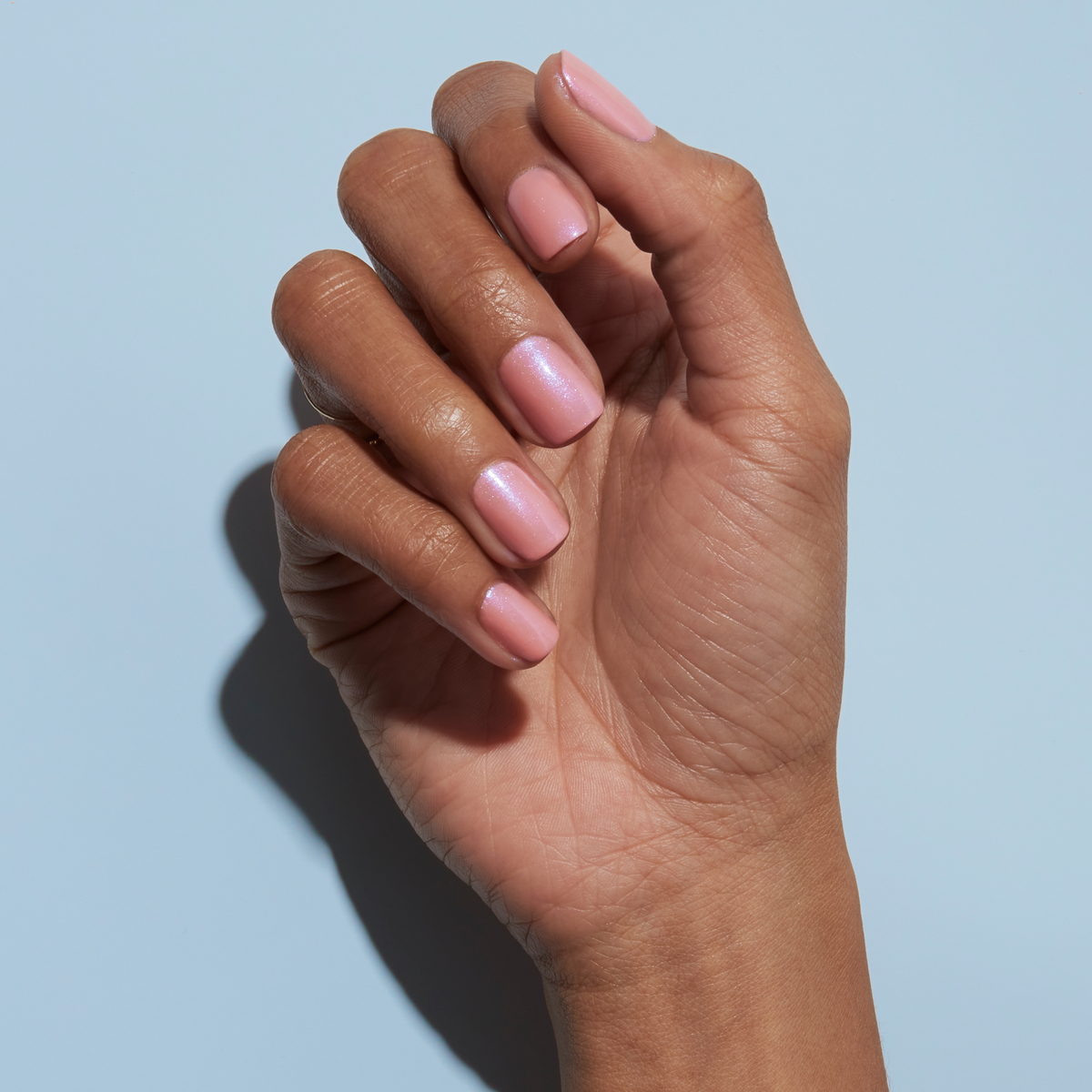 Hand with Milky Way painted on nails
