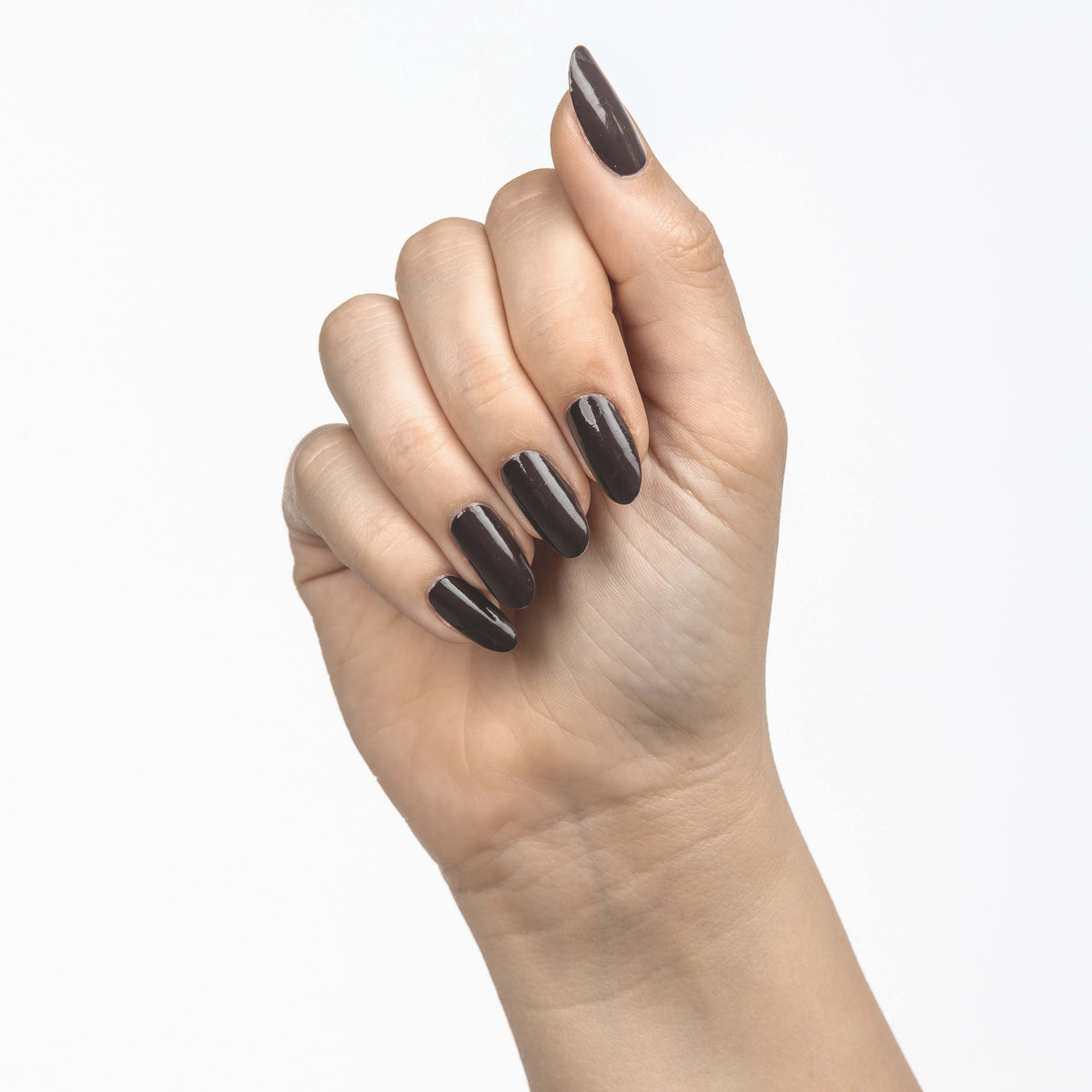 Hand with Rum Raisin painted on nails
