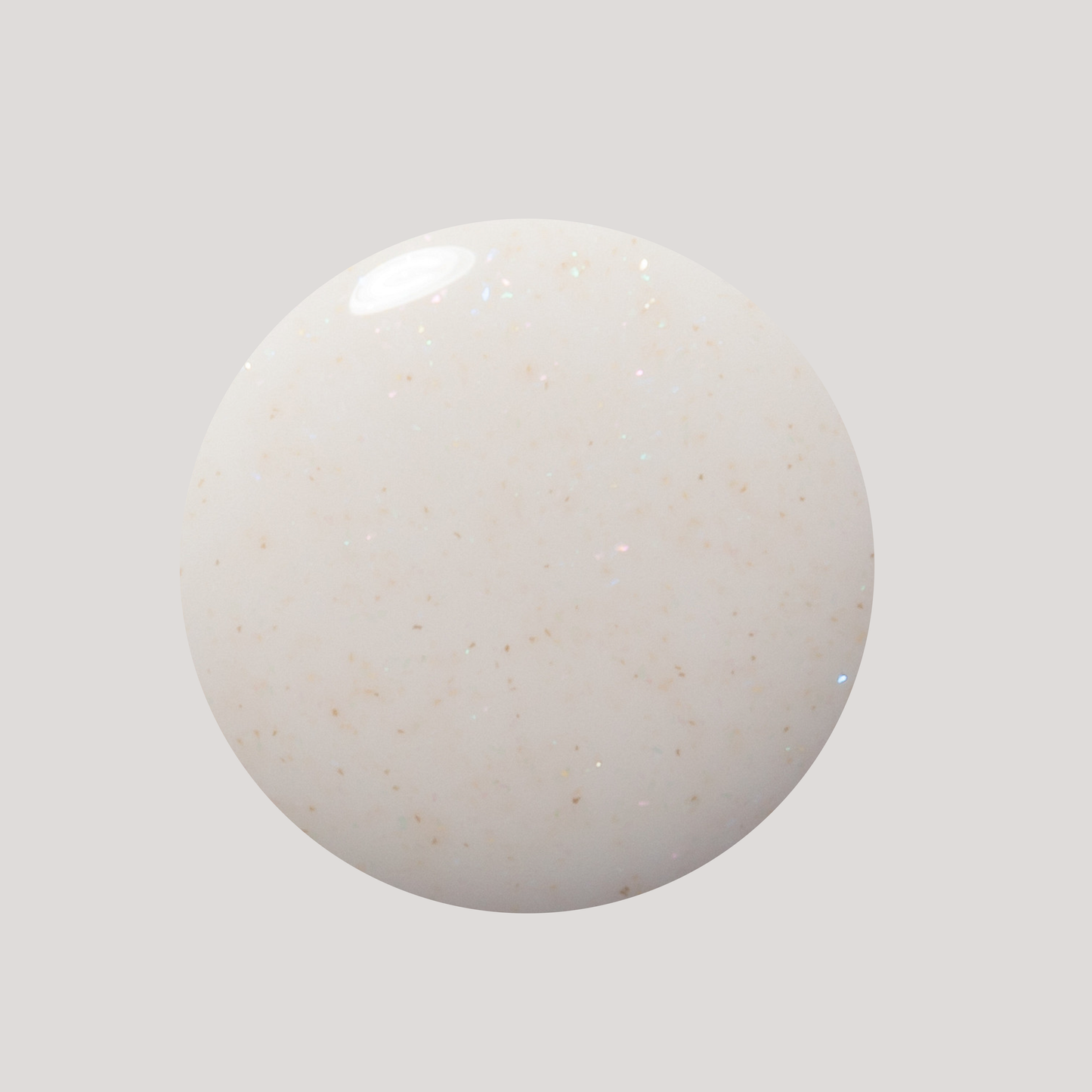 A round, glossy white ceramic or stone tile with subtle beige speckles, shown against a solid light gray background.