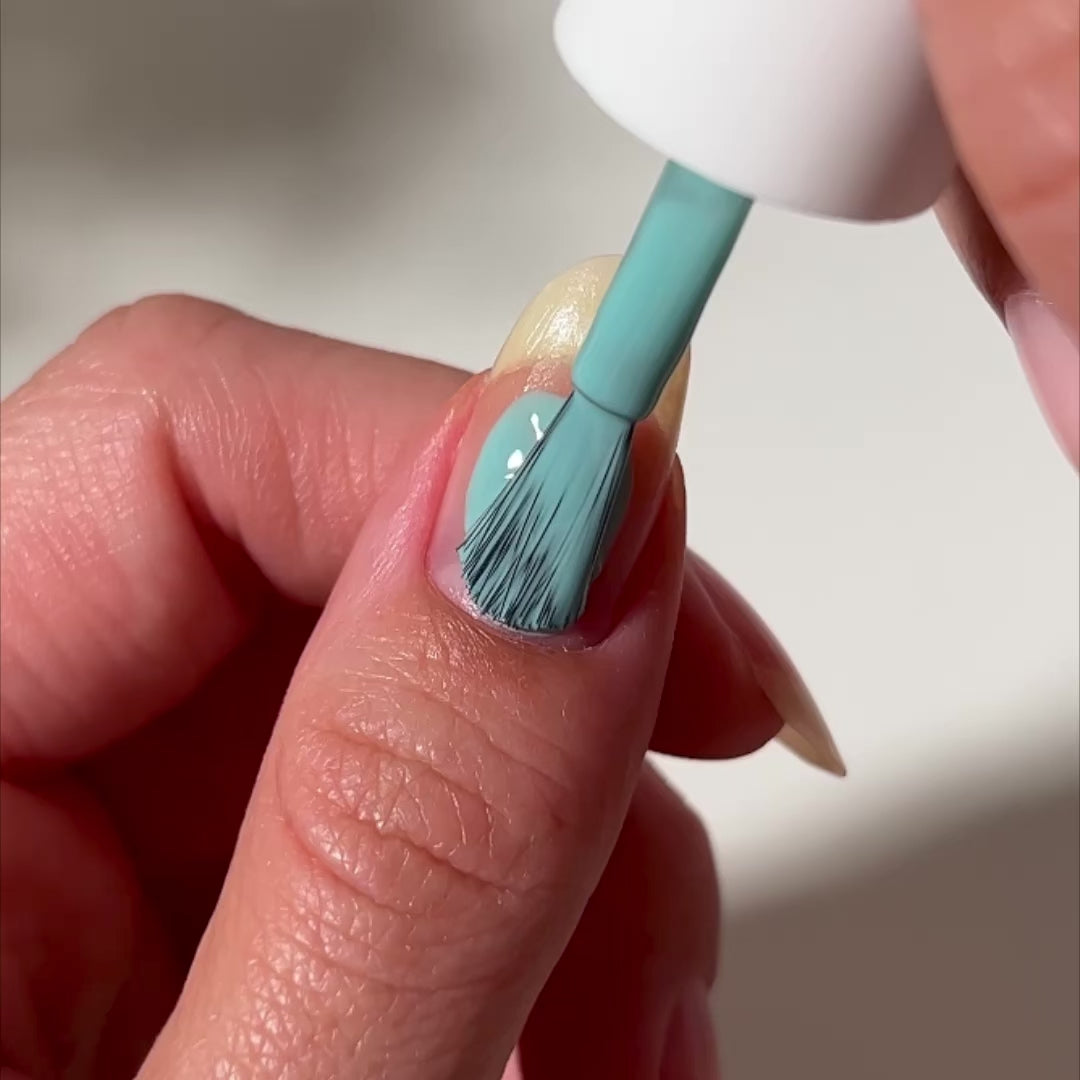 videos of confetti blue painted on nail