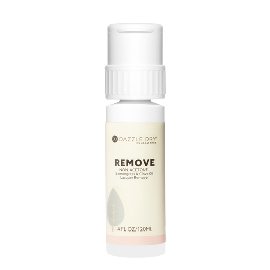Bottle of Dazzle Dry acetone remover on a white background 4FL OZ