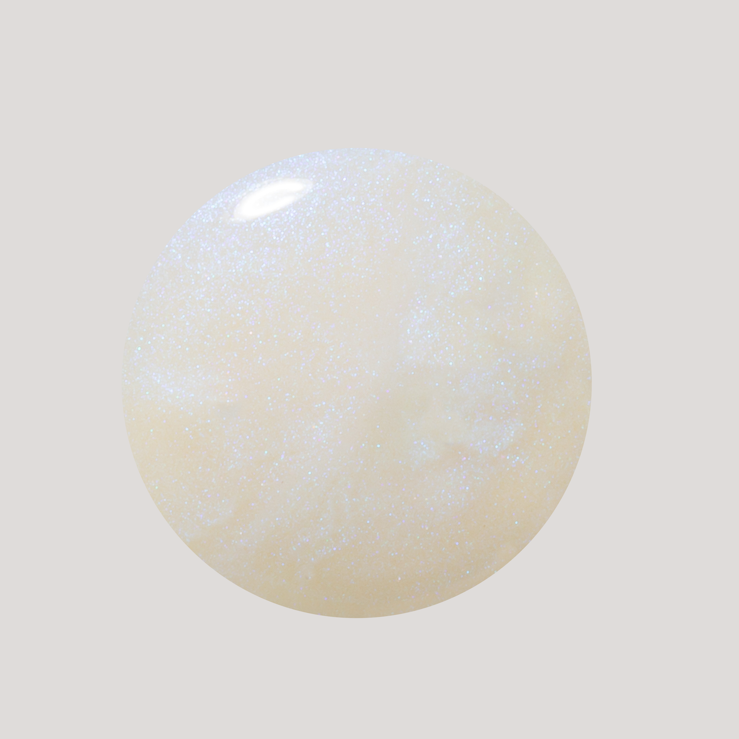 Round, beige-colored stone with a subtle pattern on a light gray background